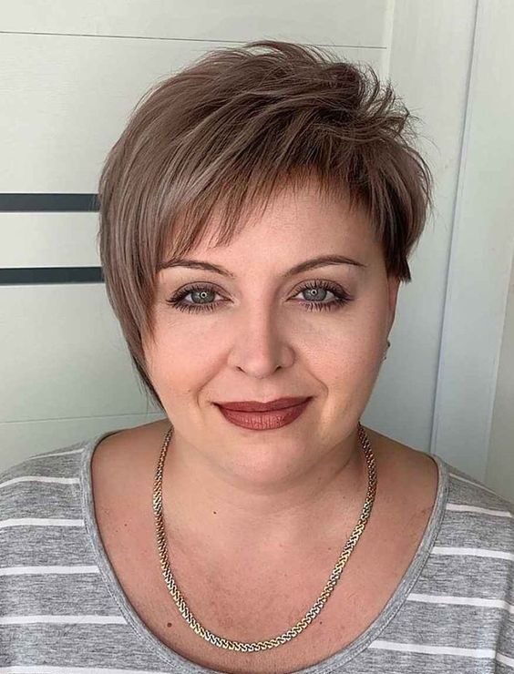 Modern Asymmetrical Cut for Plus Size Women: Edgy Short Hairstyle with a Slimming Effect