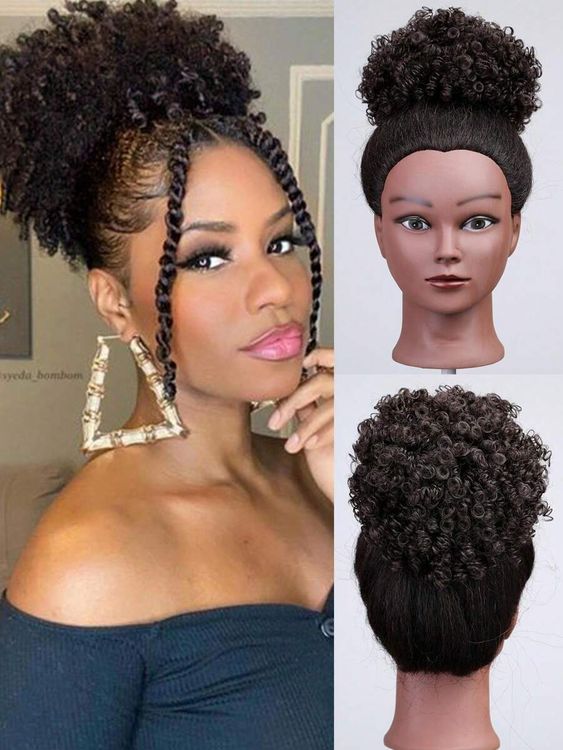 Afro puff ponytail with a voluminous puff of curls for a playful look