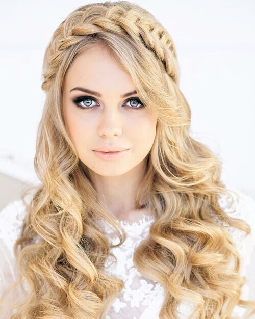 Woman with braided crown hairstyle for round face