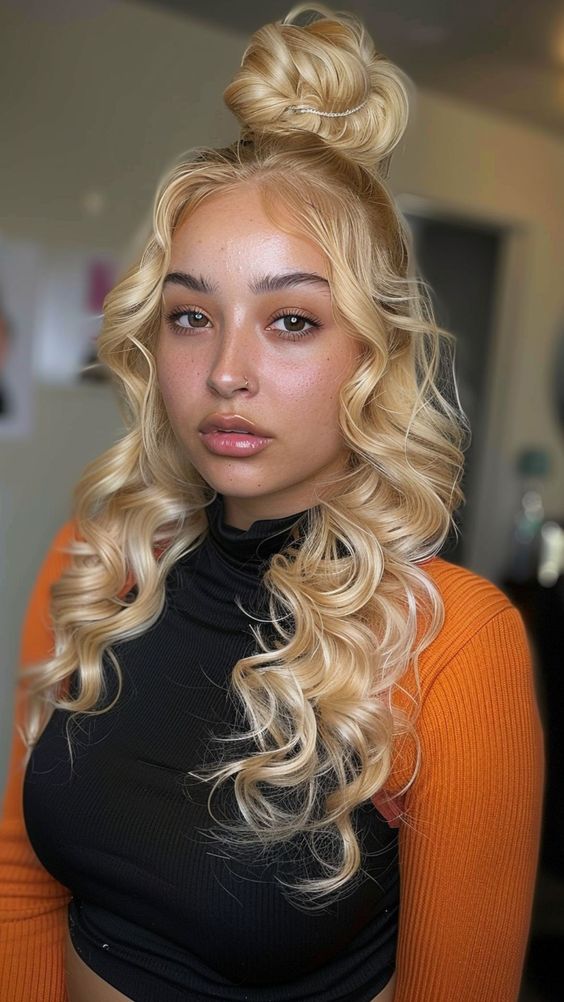 Woman with half-up half-down hairstyle for round face