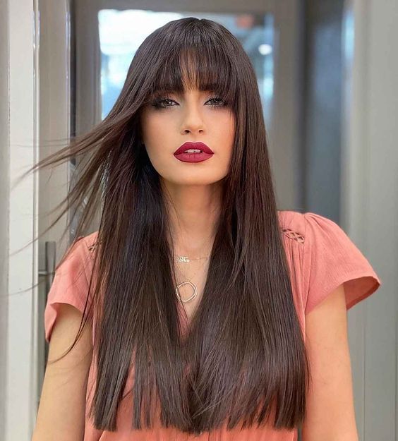 Woman with long hairstyle bangs