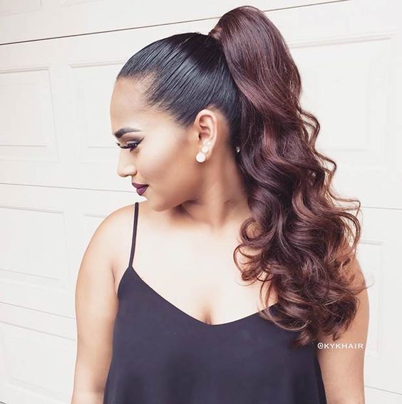 Sophisticated ponytail updo featuring a high ponytail wrapped into a chic bun, ideal for formal occasions.