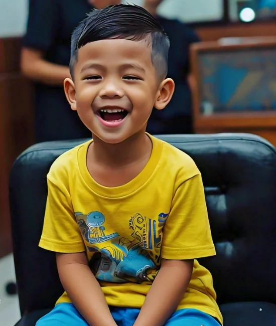 Boy sporting a Caesar cut, short layers with a front fringe.