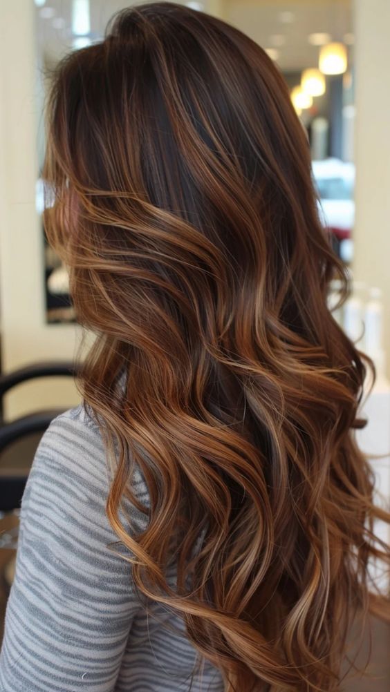 Caramel babylights on wavy hair