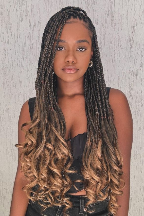 Woman with caramel highlights in braids