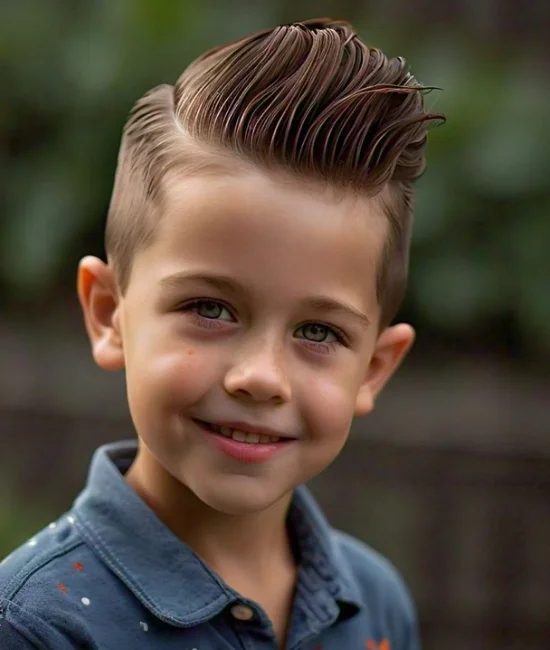 Boy with a pompadour hairstyle, voluminous top styled back.