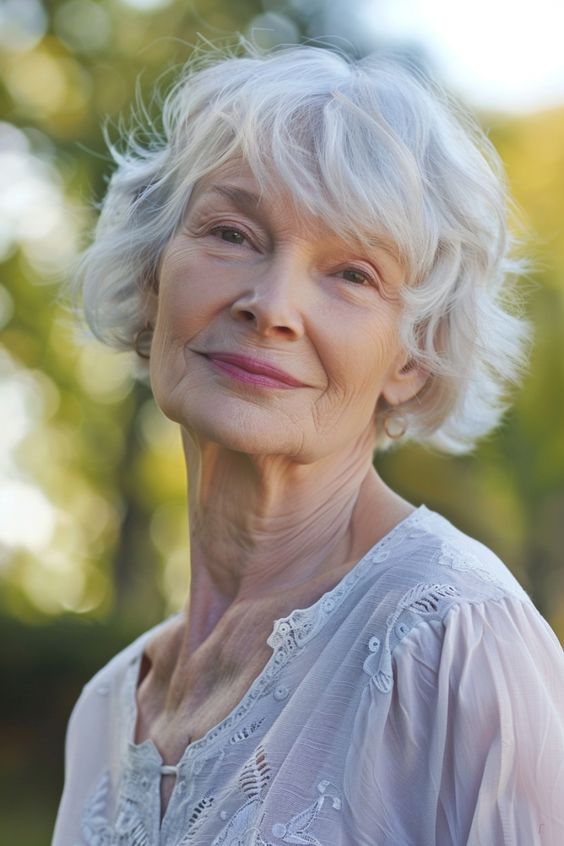 Short gray waves hairstyle for women over 70.