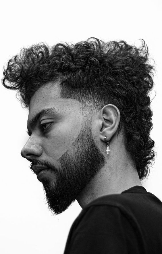 Wavy mullet hairstyle for Black men in 2024